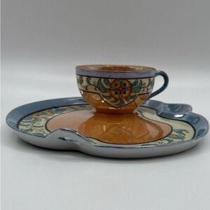 Vintage Hand-Painted Orange and Blue Decorative Cup and Saucer Set